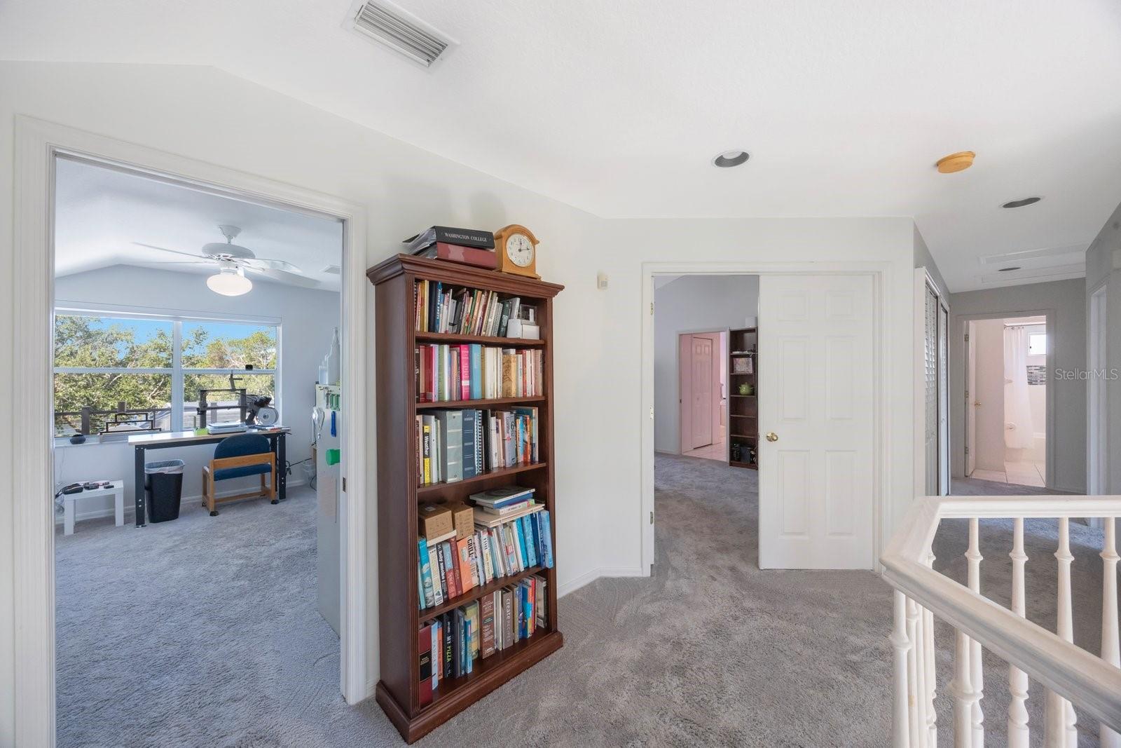 Second floor landing, 4th bedroom on left, primary bedroom straight ahead