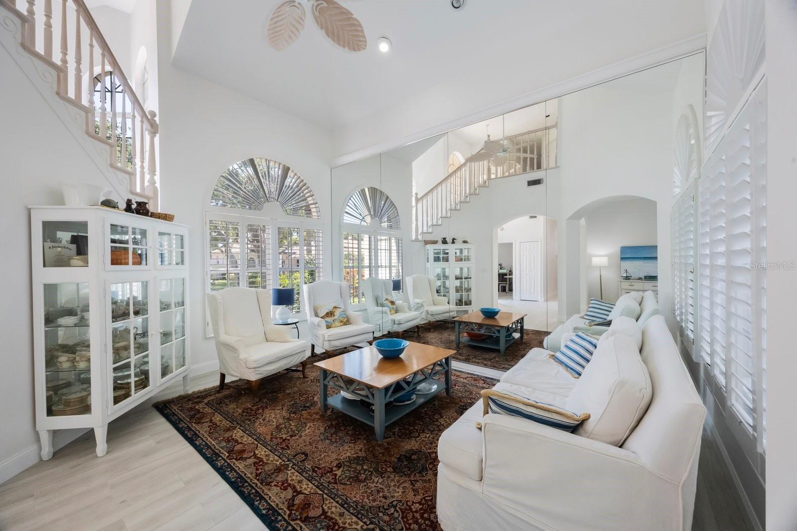 Staircase ascends to second floor landing