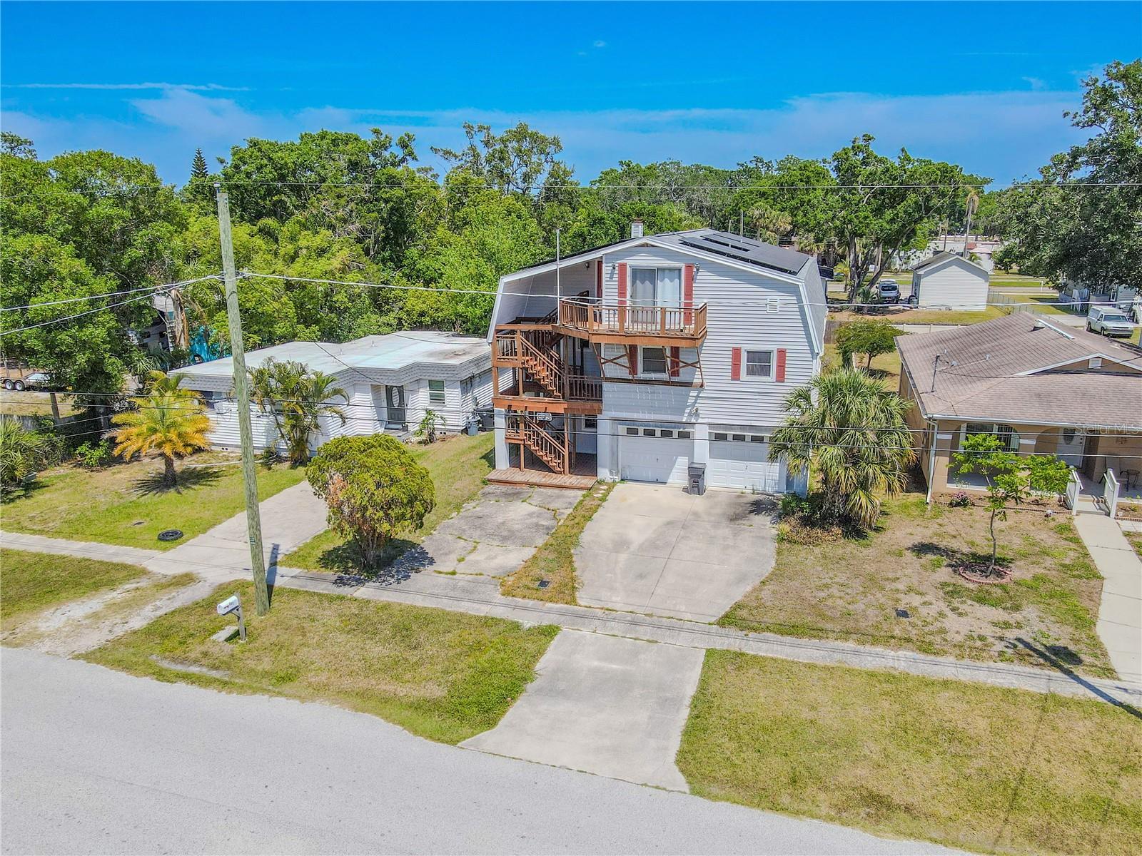 3-car garage with workshop and bonus room on first floor