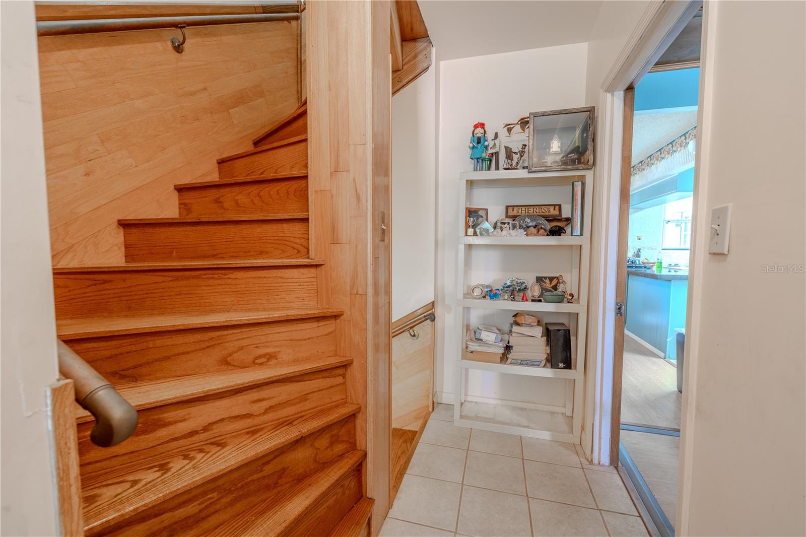 Stairs lead to level 3 with 2 more bedrooms and another full bath.