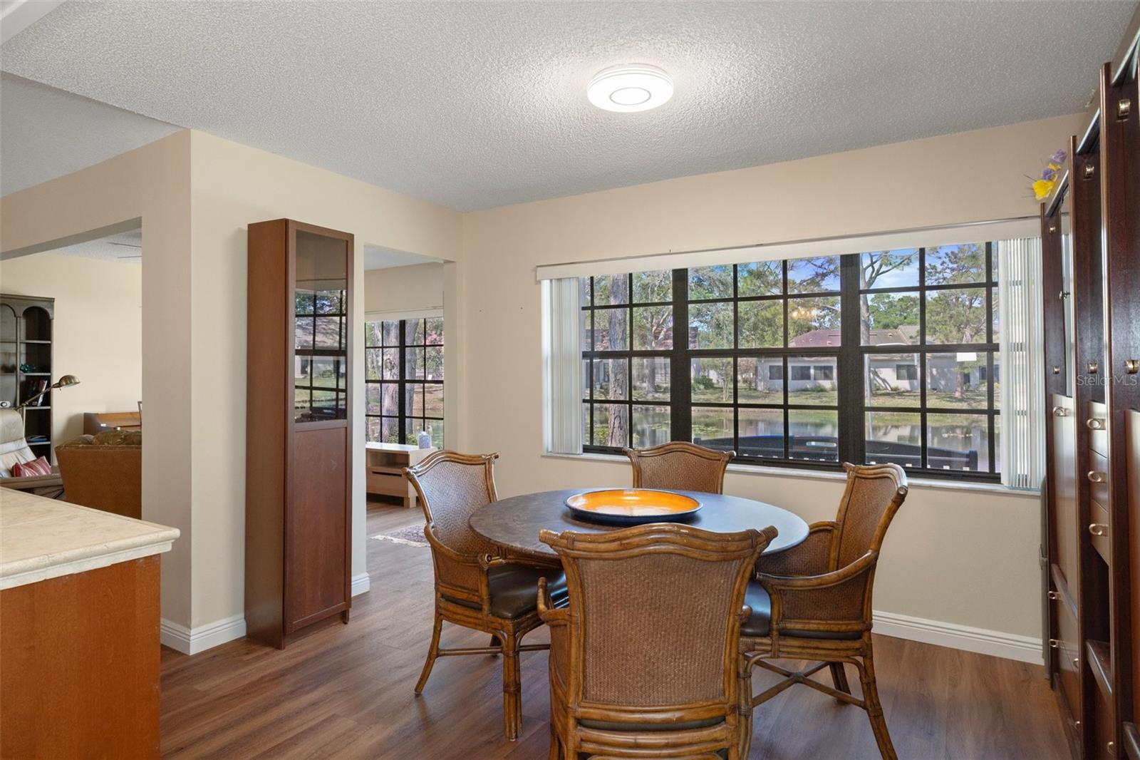 Eat-in Kitchen Area with View to Back Yard Pond