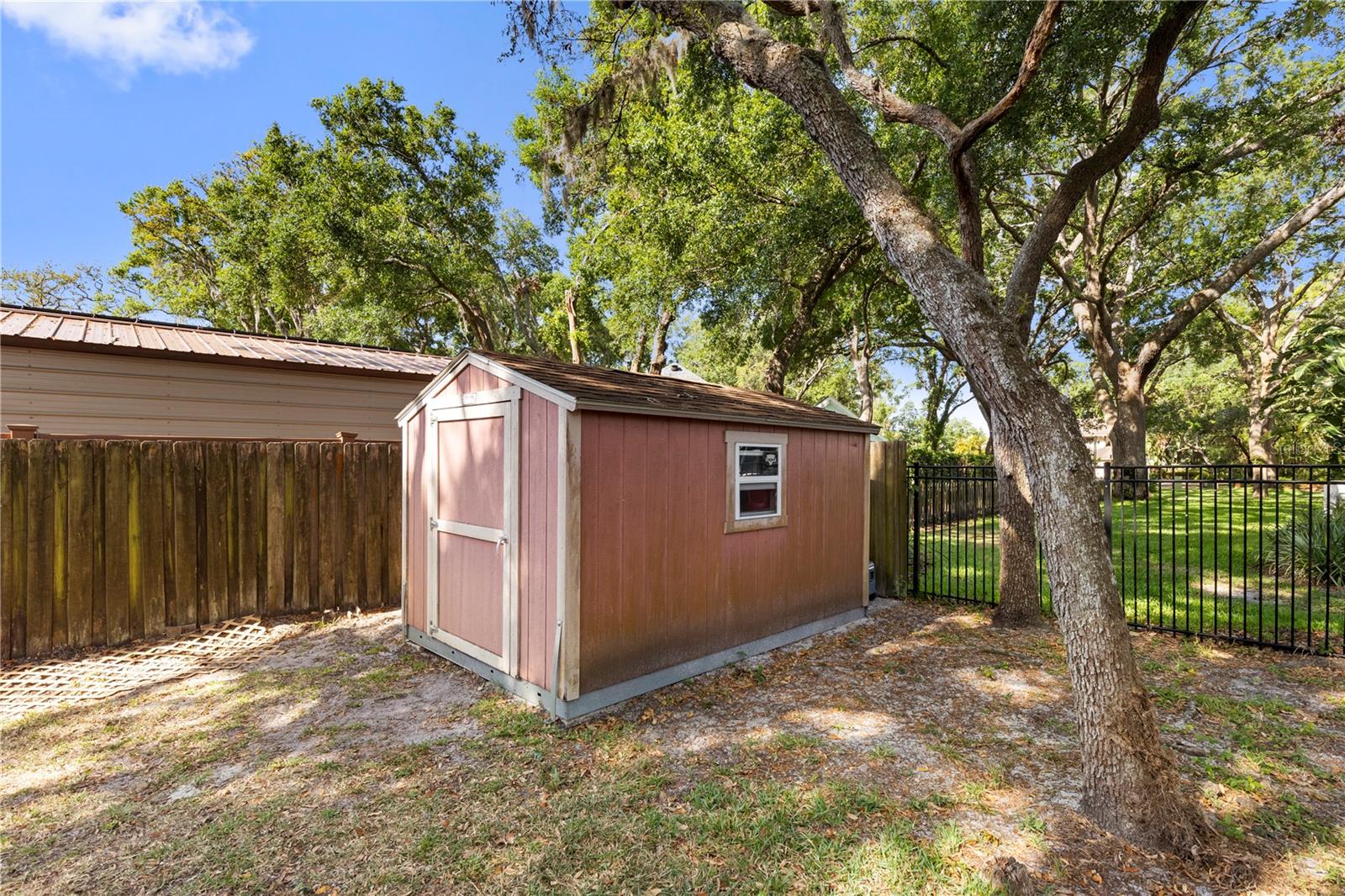 Storage Shed stays with the home!