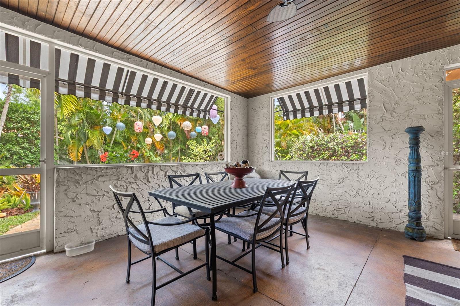 Screened in sanctuary overlooking the private tranquil gardens