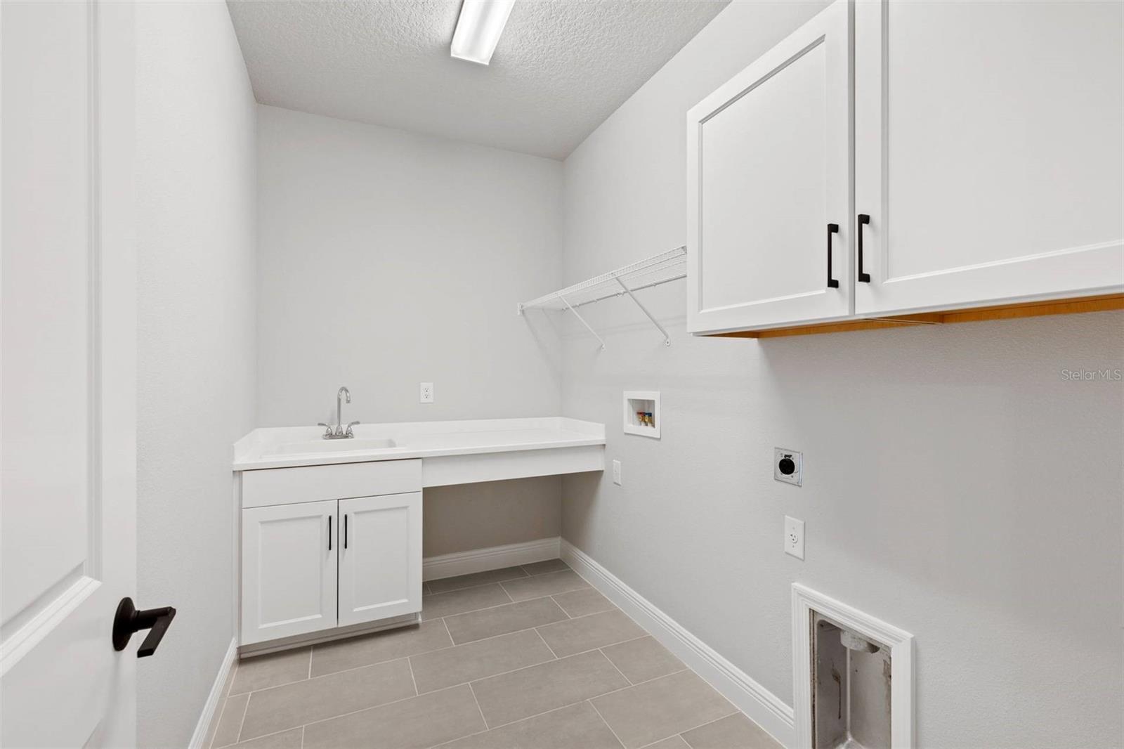 Utility Room **Photos are of a Similar Home