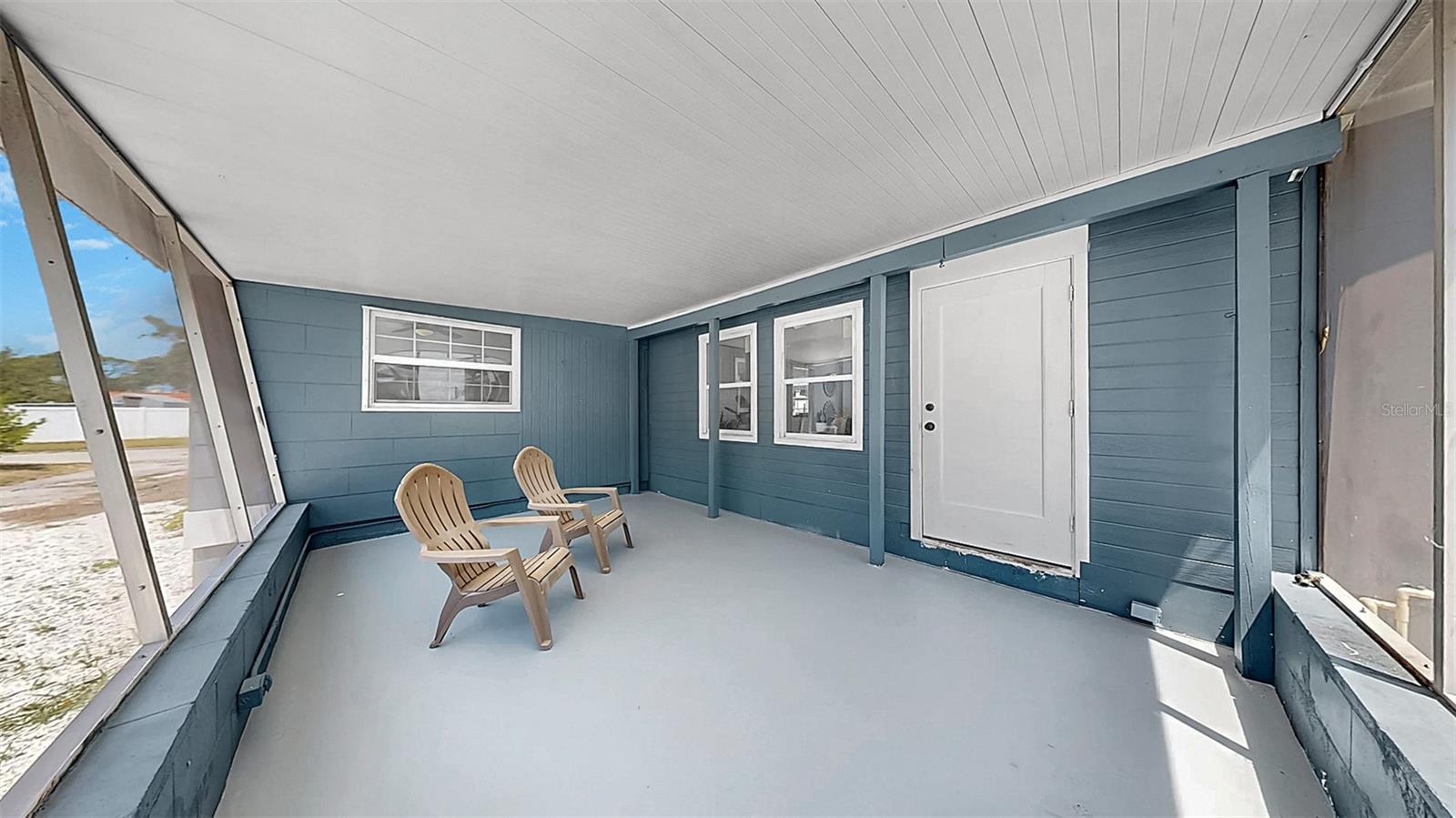 Fully screened in back porch