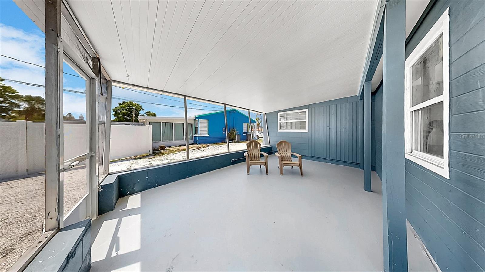 Fully screened in back porch!