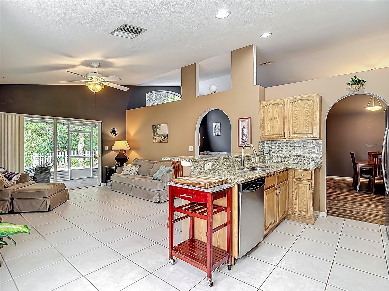 Kitchen - Dining Room - Living Room - Family Room - Sliding Door to Outdoor Living Space