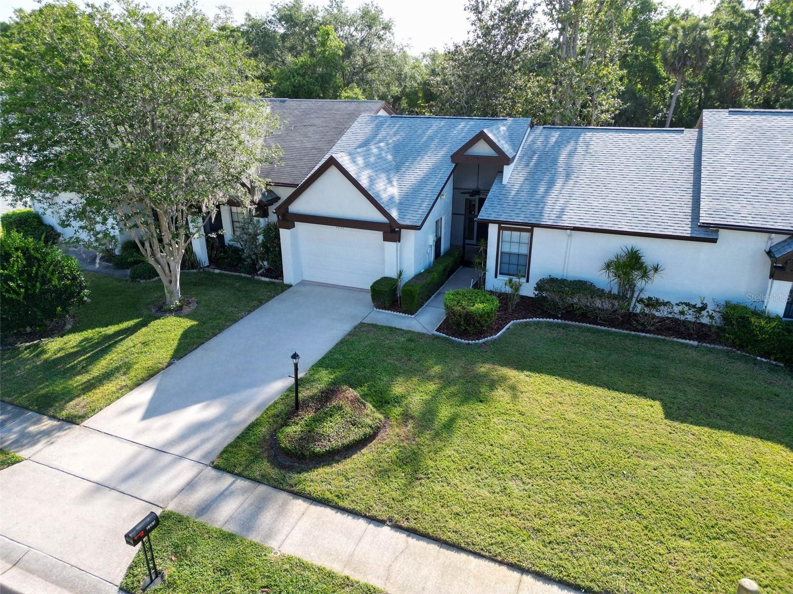Private driveway with attached garage & roof (2022)~