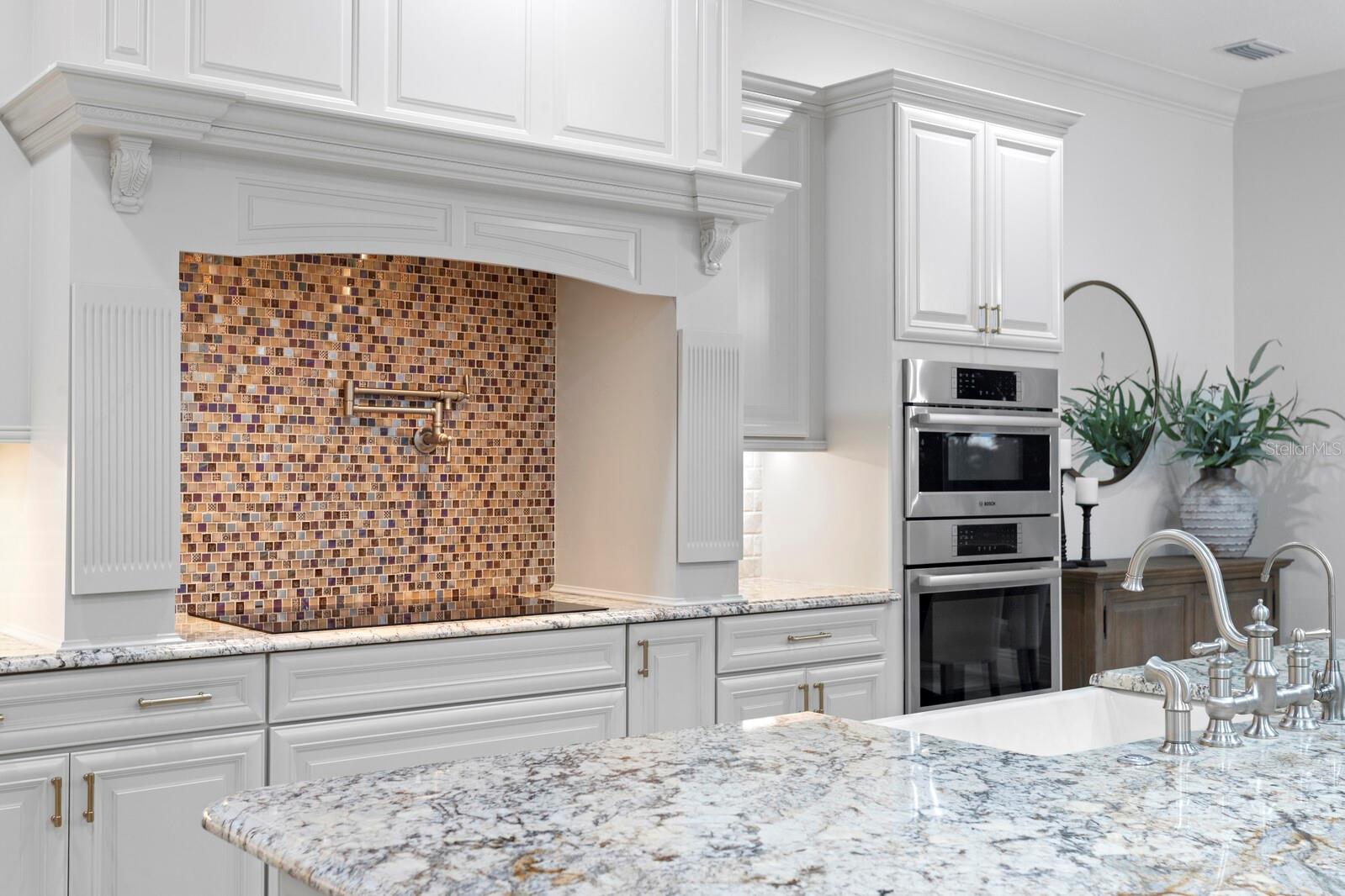 Custom vent hood and convenient pot filler!