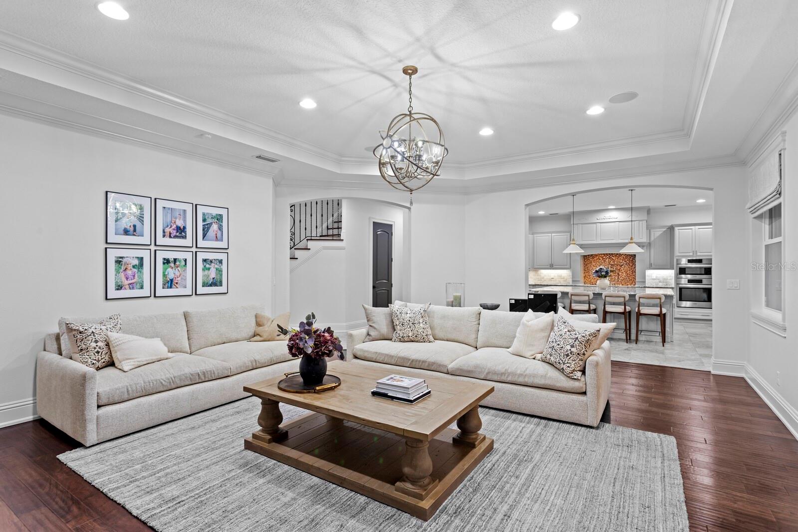 High ceilings, hardwood floors and open to the kitchen!