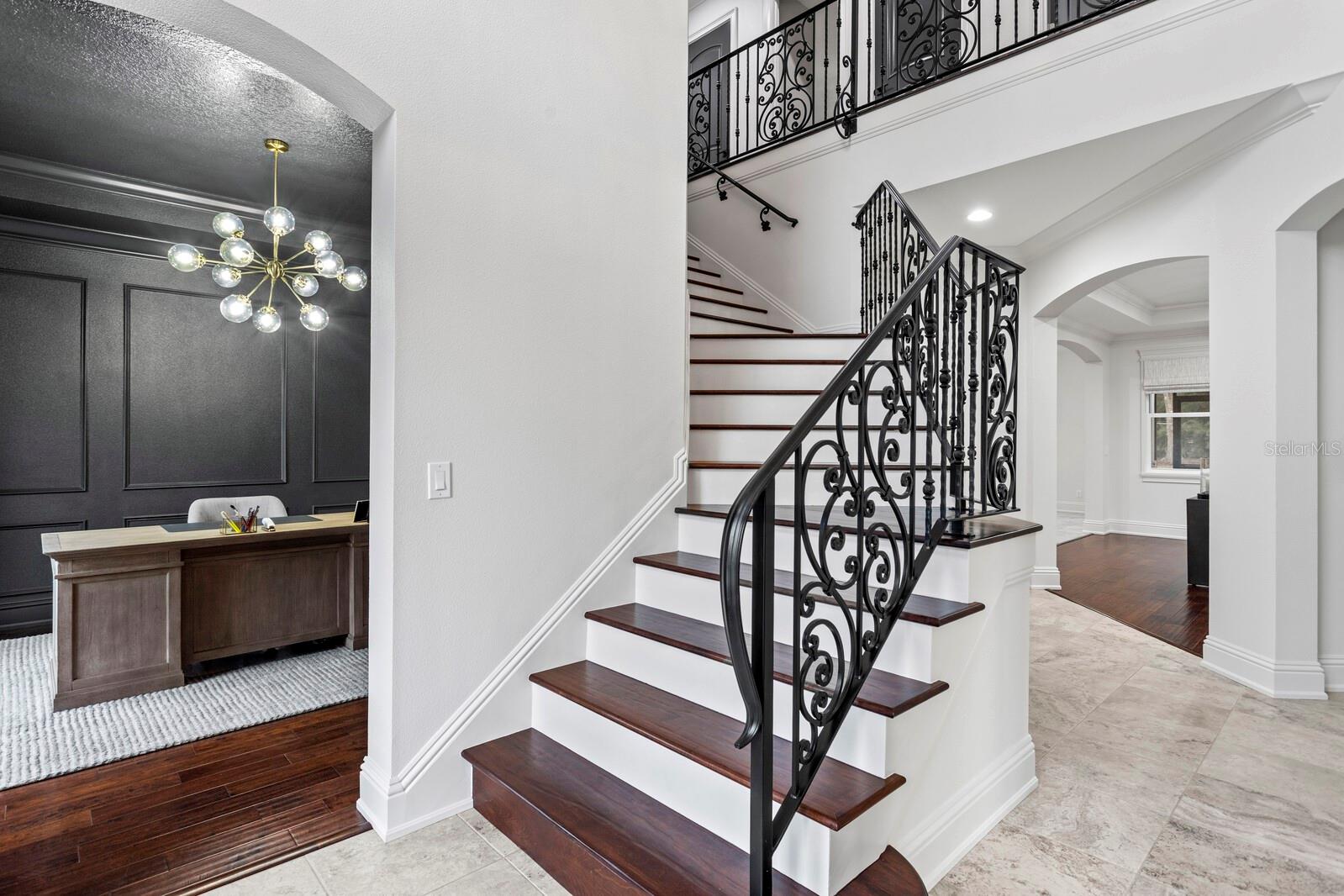 Handmade iron railing on the stairs and balconies adds a touch of artistry!