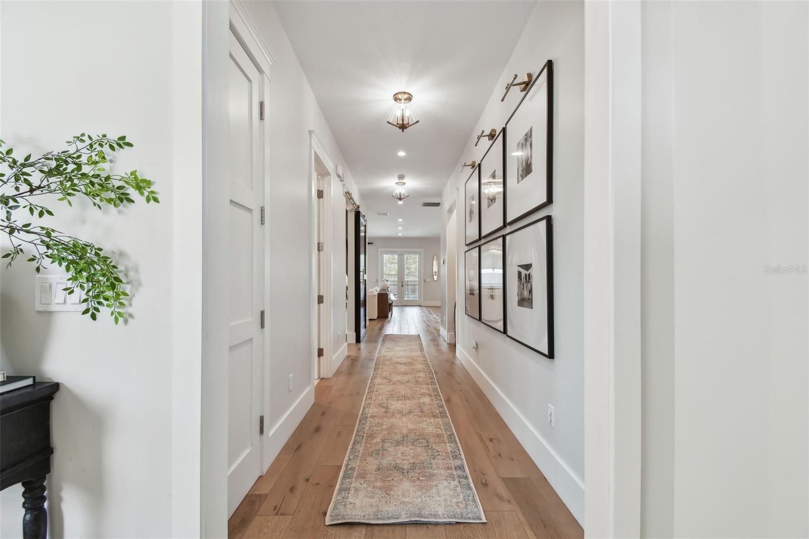 Hallway to Living Area and Kitchen