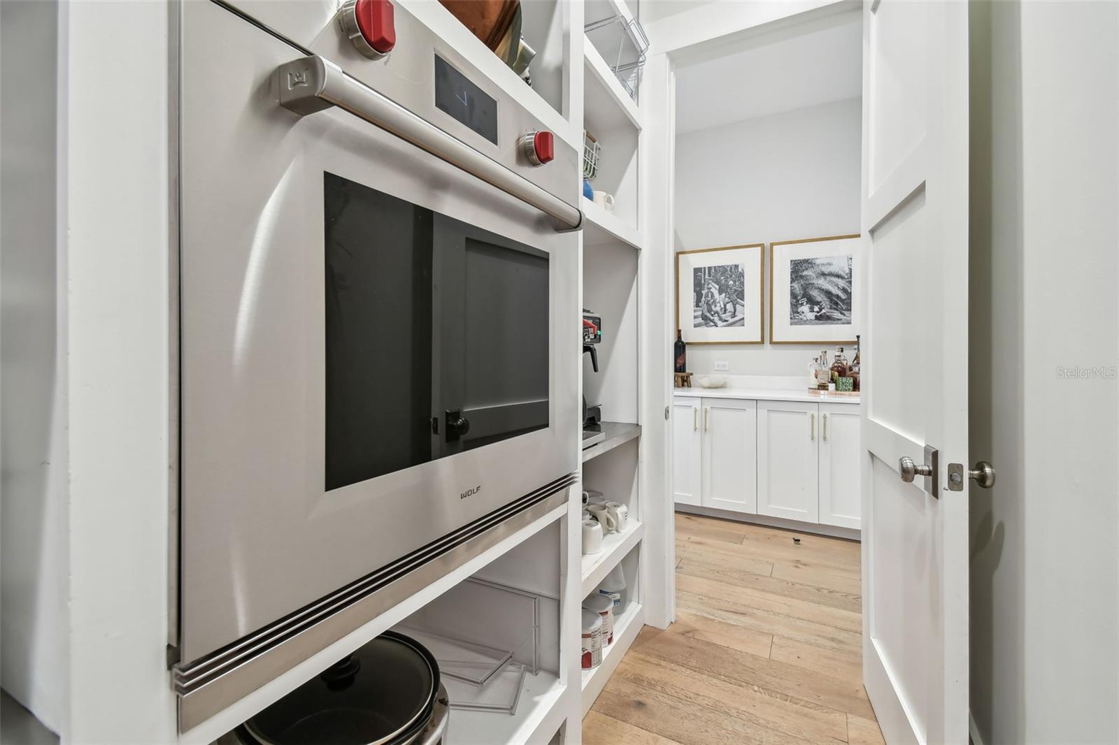 Walk-in Pantry with Additional Full-Size Refrigerator, Built-in Oven, Serving Station