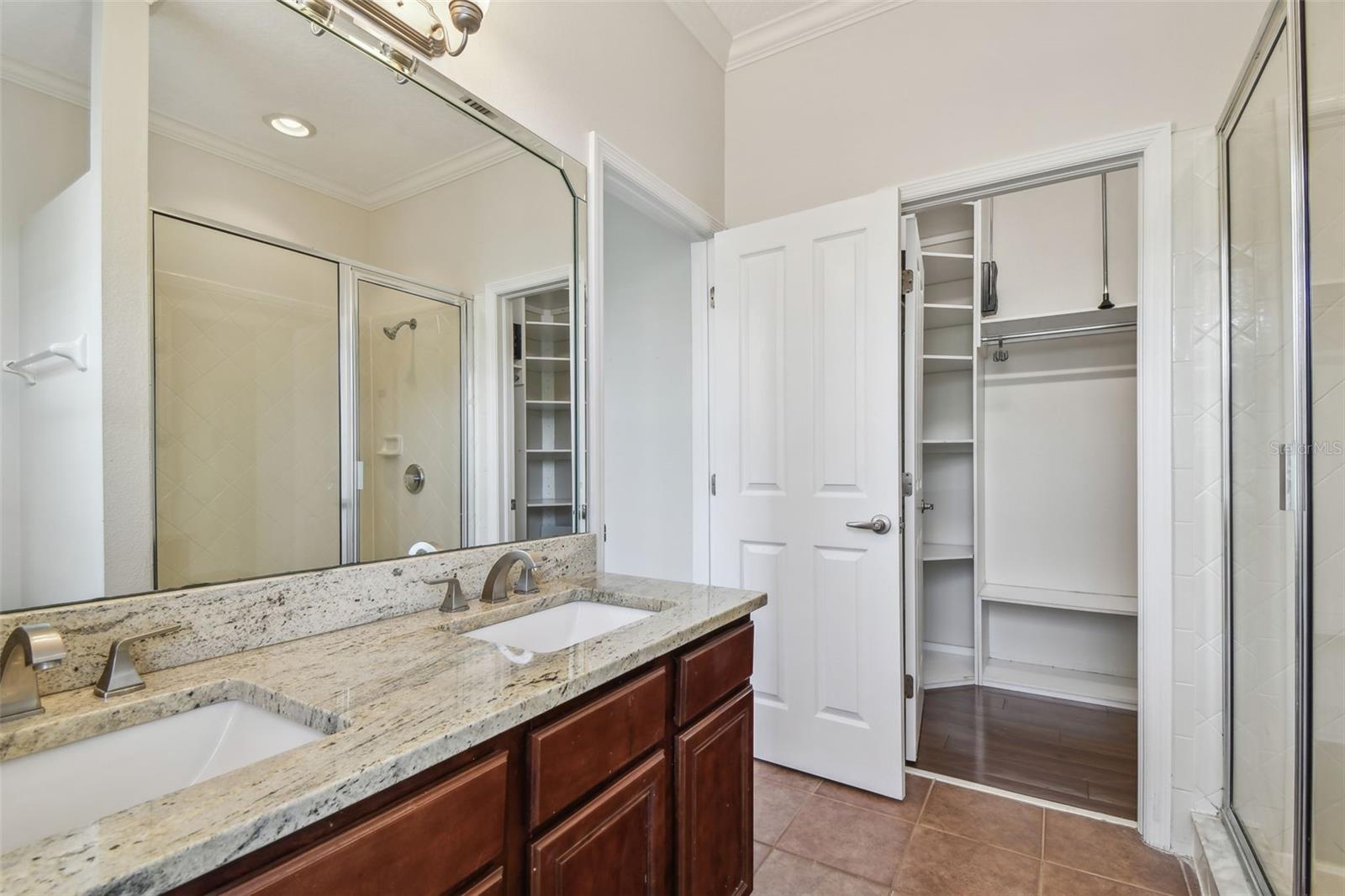 Walk-in closet located in the bathroom