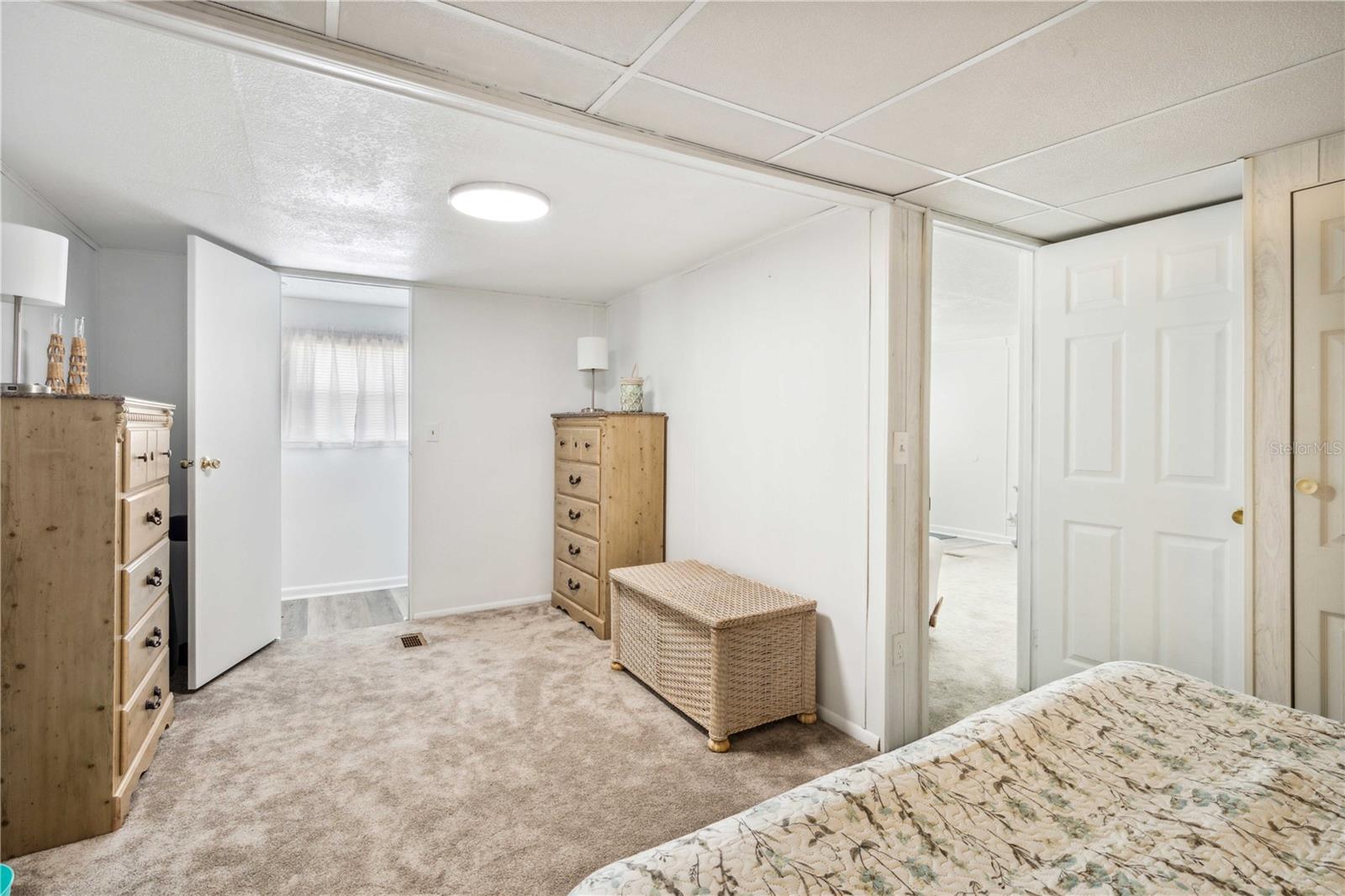 Updated step-in shower, vanity, flooring, and fixtures.