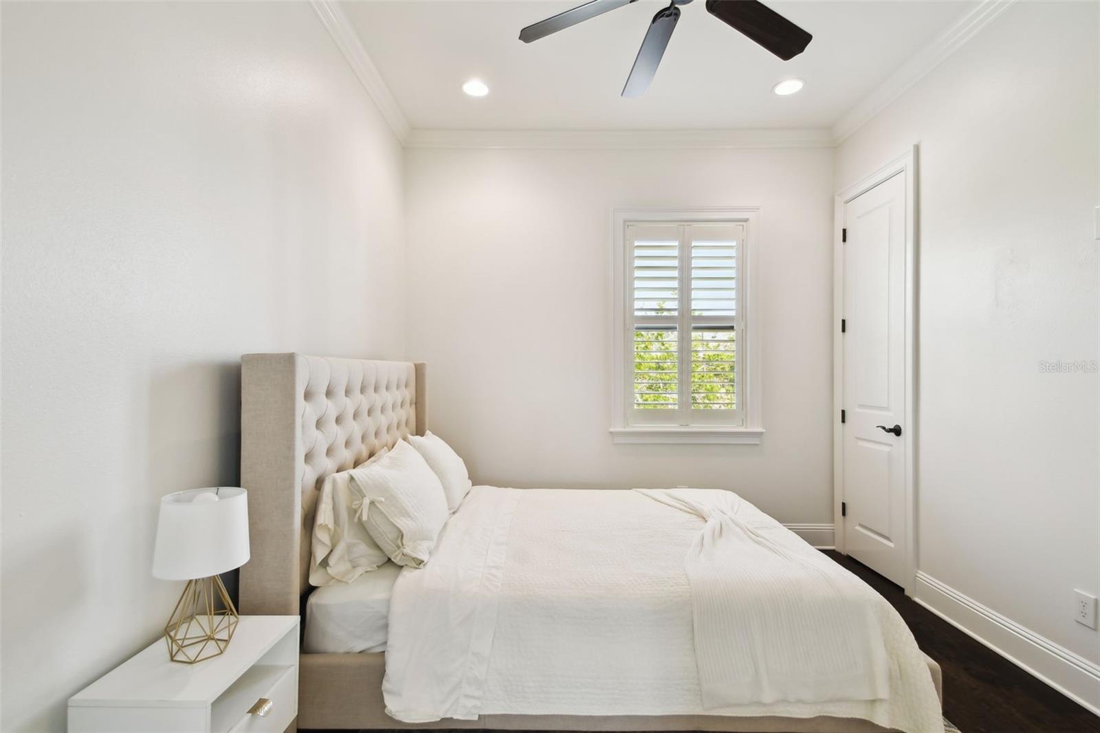 Guest bedroom with custom closet