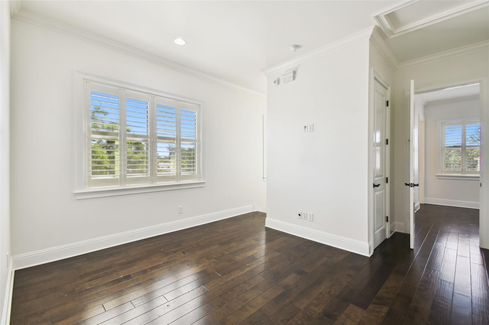 Guest bedroom with custom closet