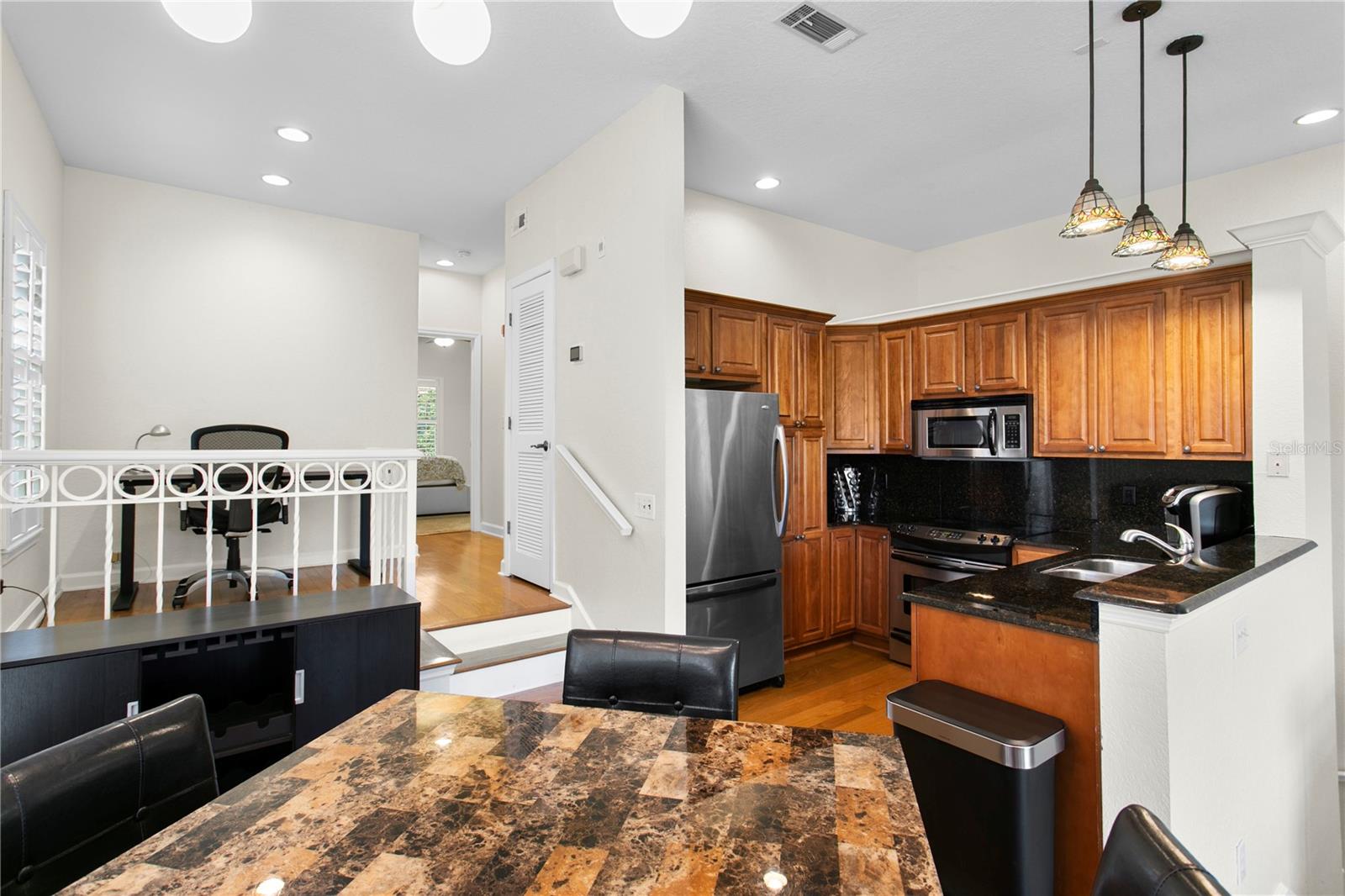 Open concept kitchen that overlooks the living room