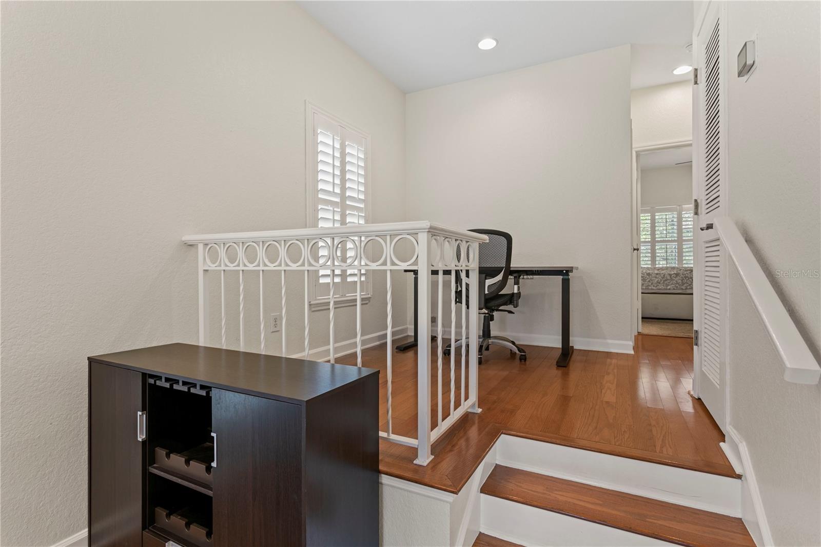 The loft area makes a great place for an home office—tucked away just enough to stay focused, but still connected to the heart of the home.