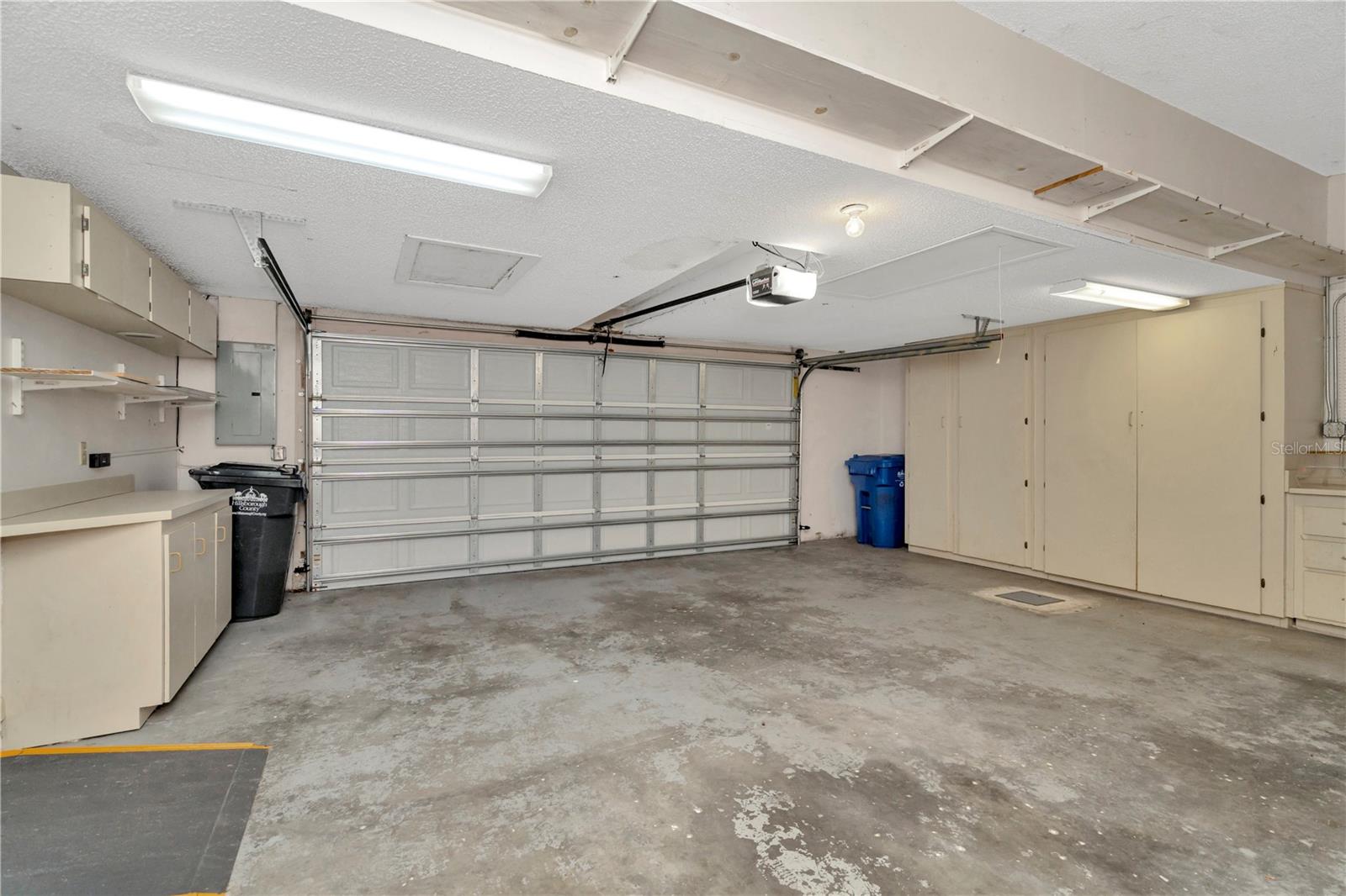 Two car garage and storage cabinets