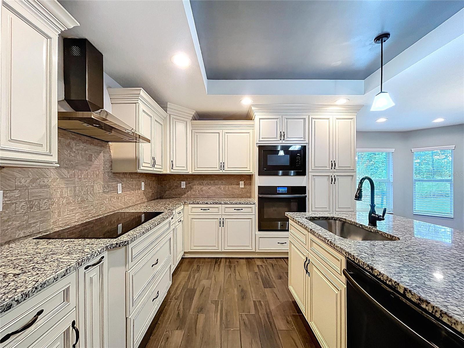 Extra cabinet space and tray ceilings.
