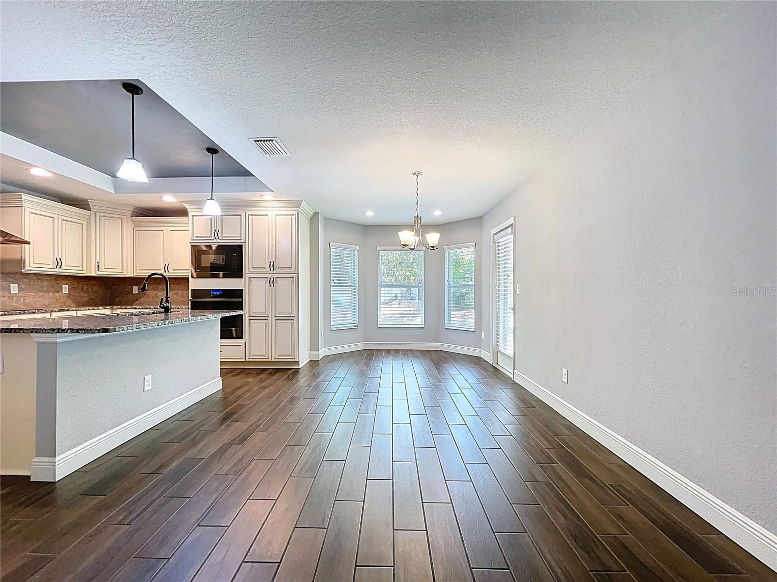 Seamless flow from kitchen to living room.