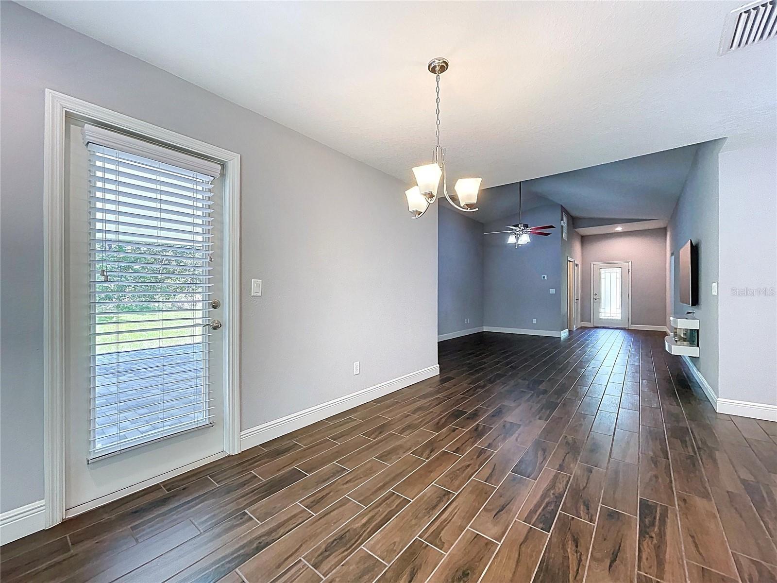 Patio access through door in dining area.