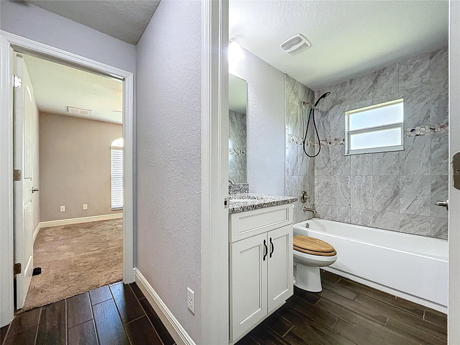 Guest bathroom with Jack-and-Jill layout.