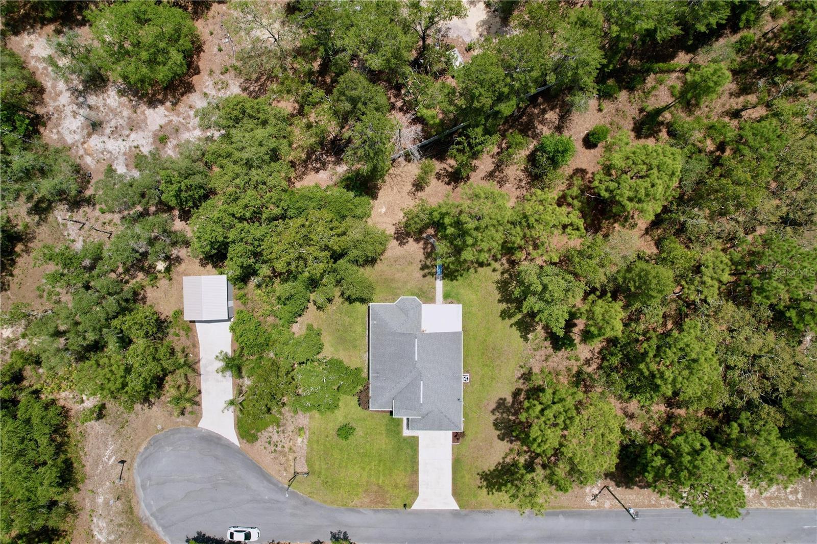 Aerial view shows end-of-cul-de-sac location.