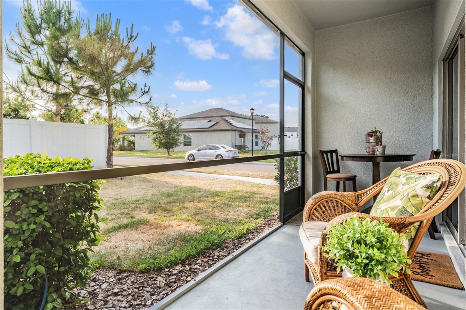 Screened lanai overlooks backyard