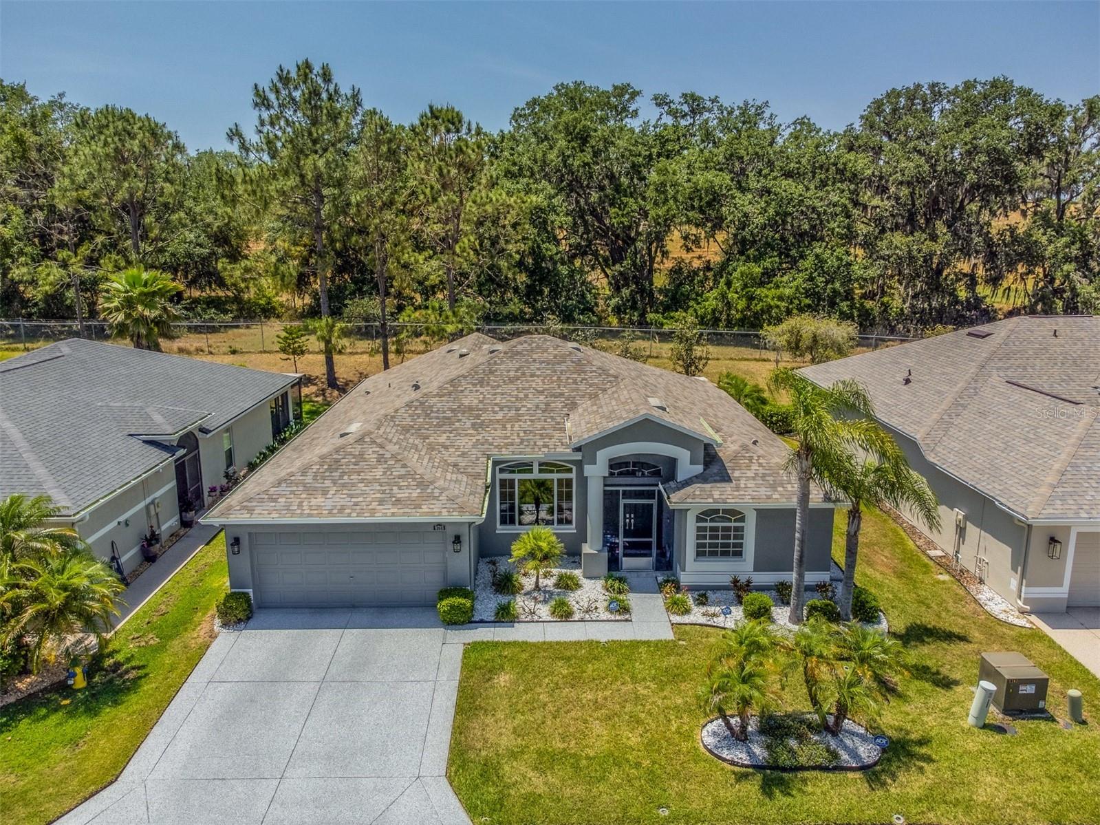 Peaceful situated on a premium lot with privacy and nature behind you!