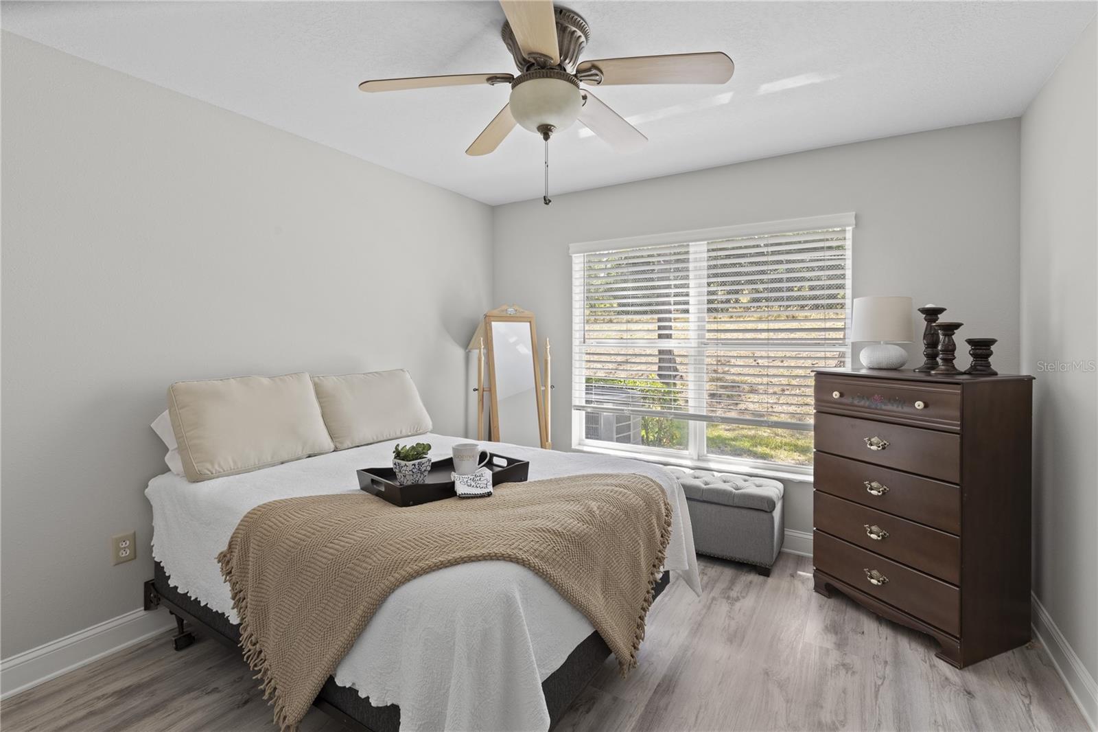 Guest bedroom with double window for natural light!