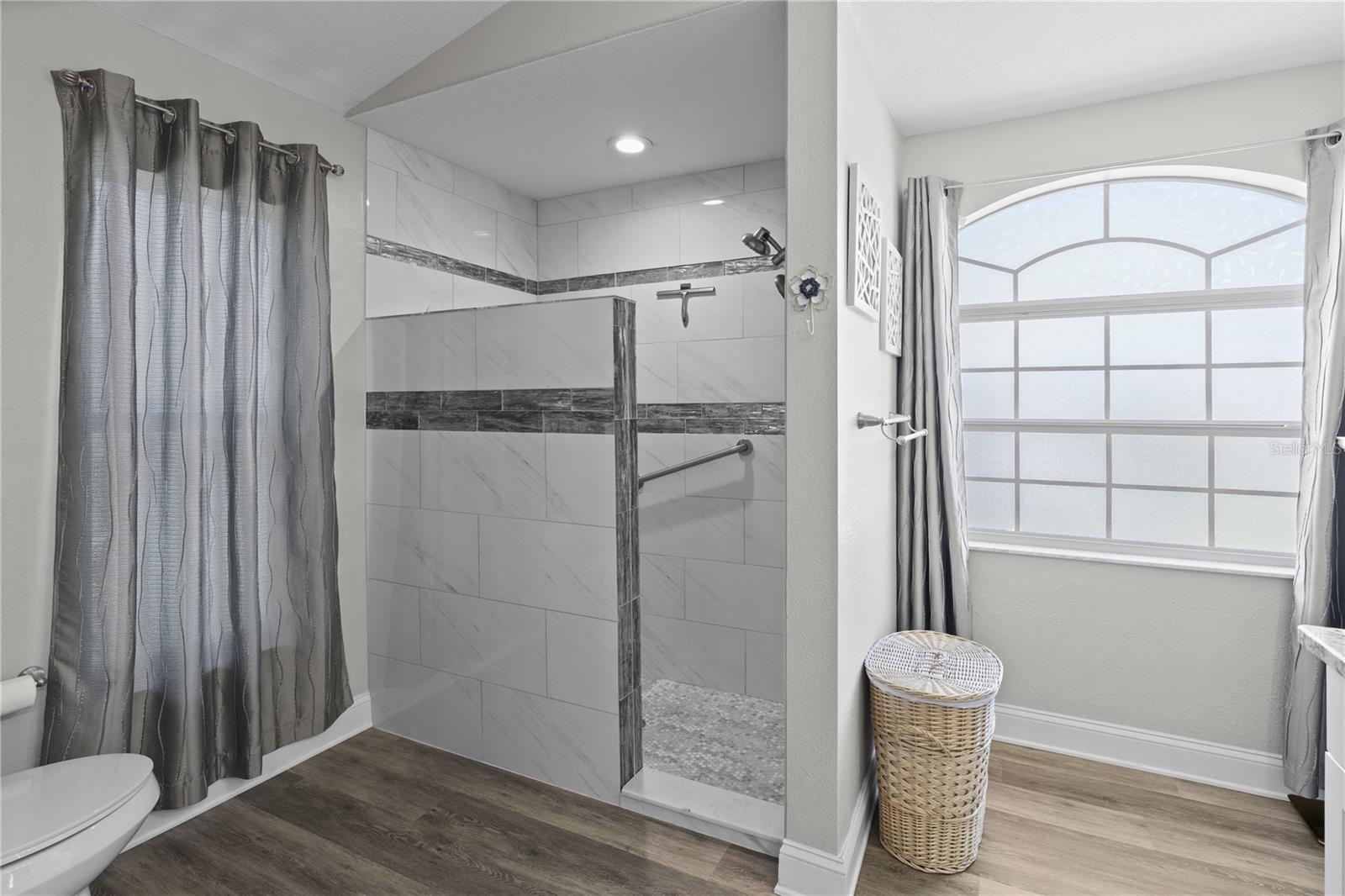 Updated shower and lots of natural lighting