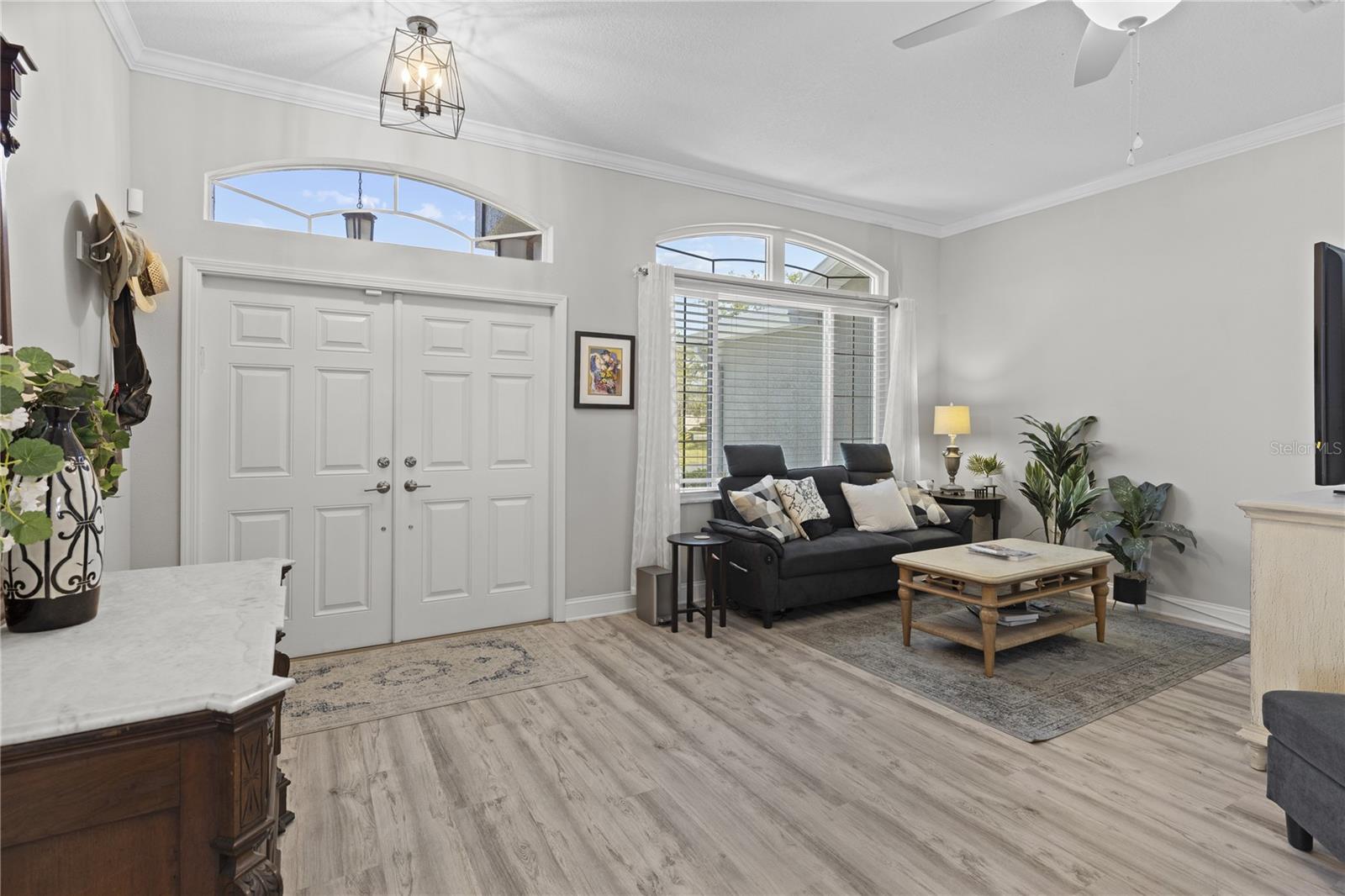 Double door entry into Formal living and dining ares