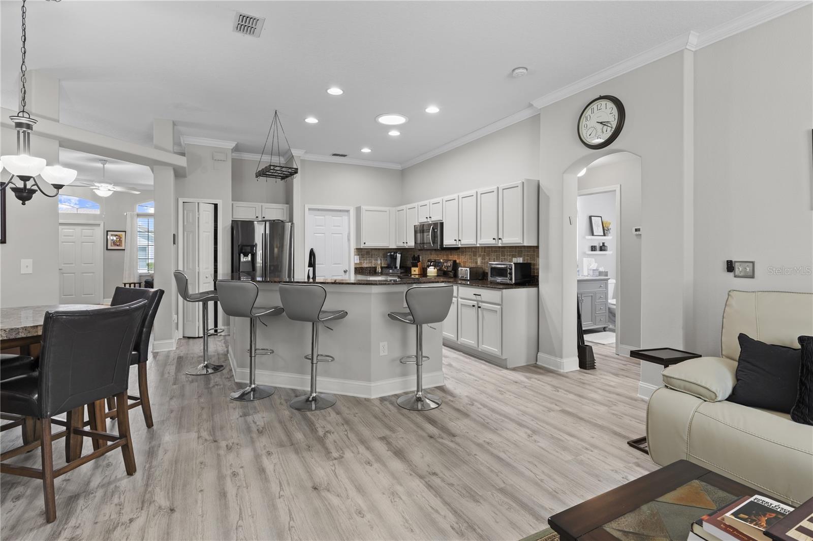 Open kitchen with breakfast bar and eat in nook