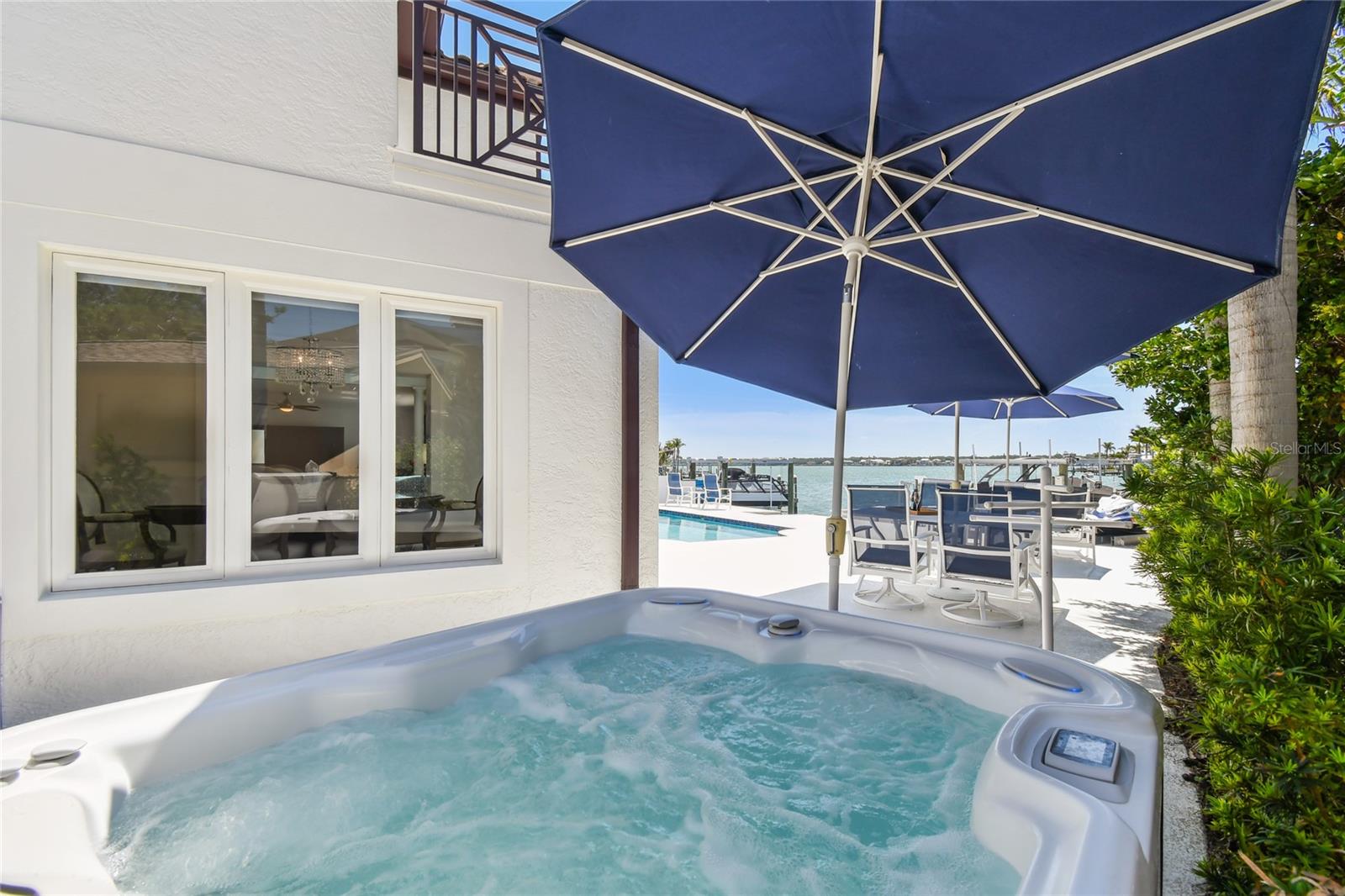 Relax in your spa and enjoy breathtaking waterviews