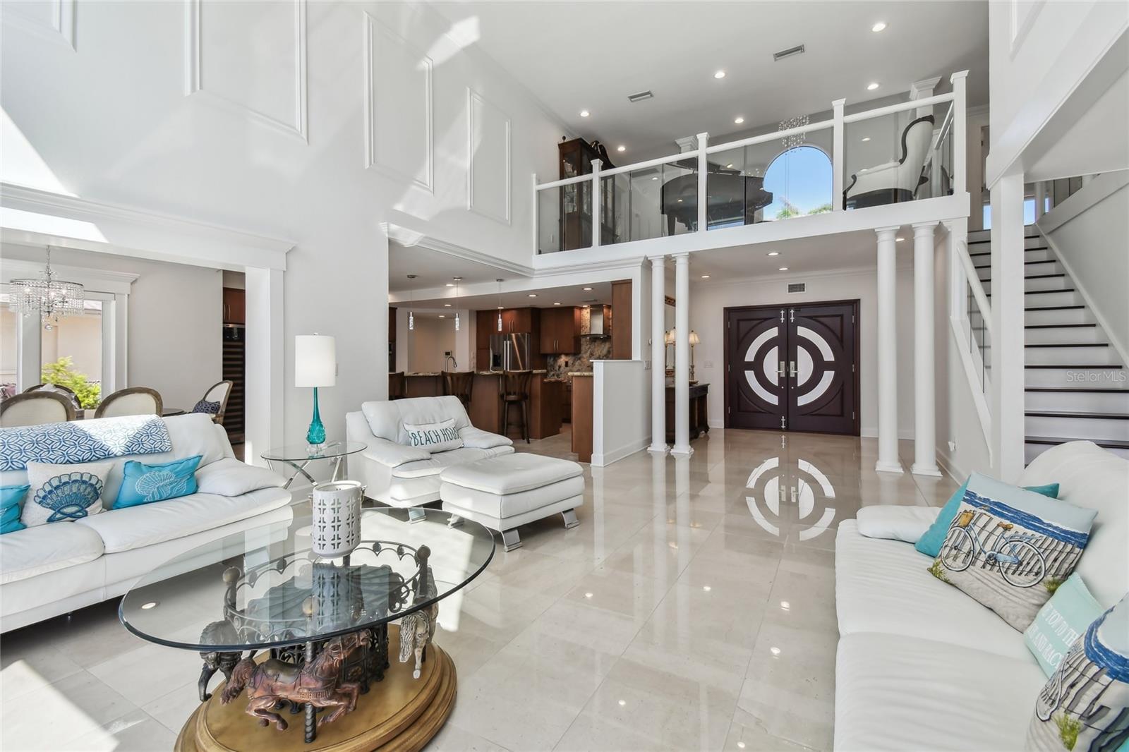 Lavish Living room, gleaming marble flooring, stunning loft