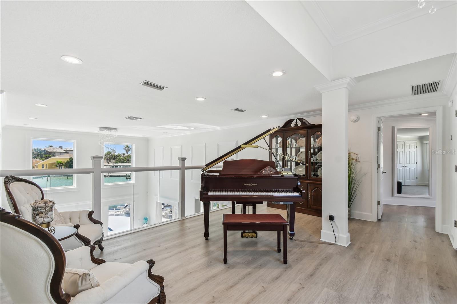 Stunning waterviews from loft area, Primary bedroom entranceway