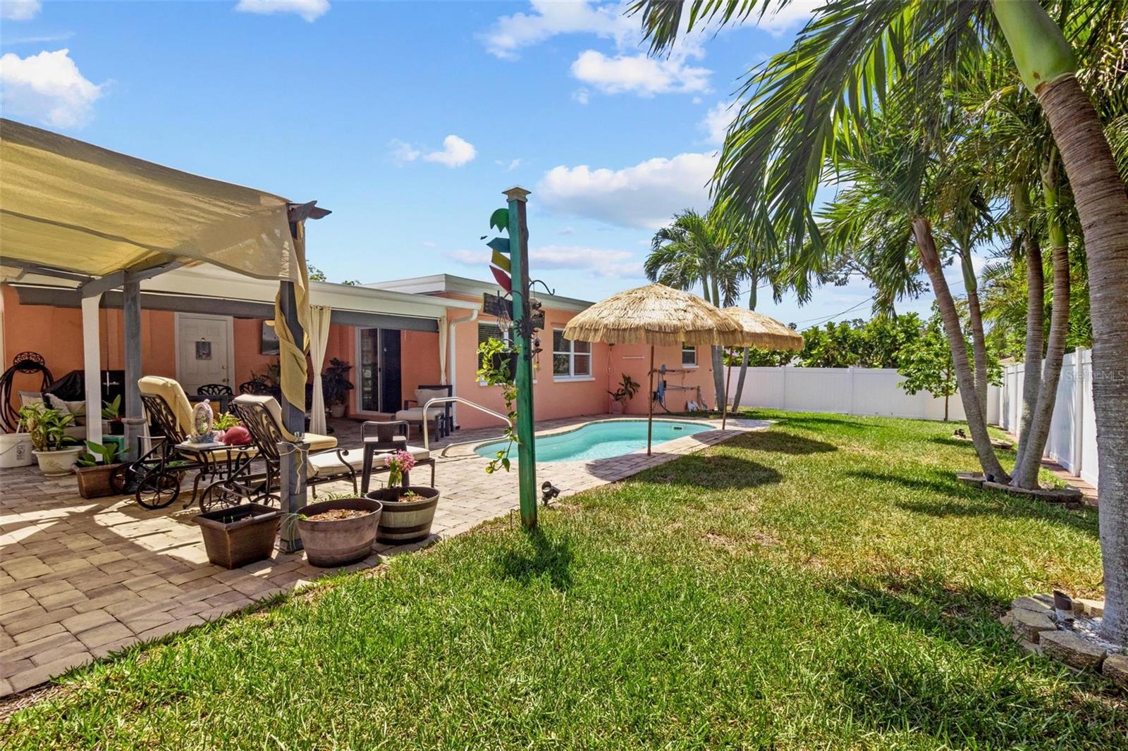 Lots of green space with pool and covered areas!