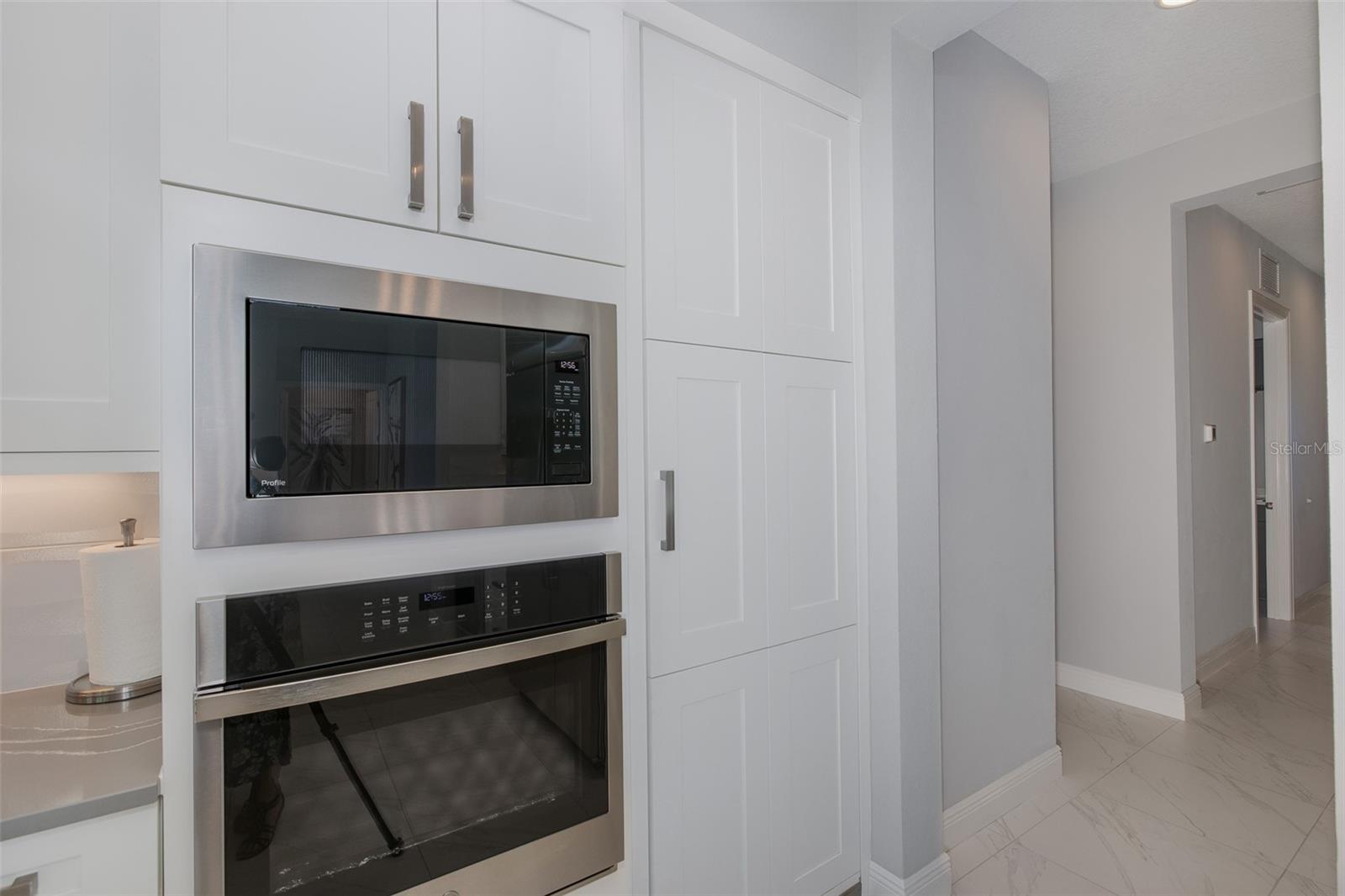Wall oven & microwave with hidden pantry!