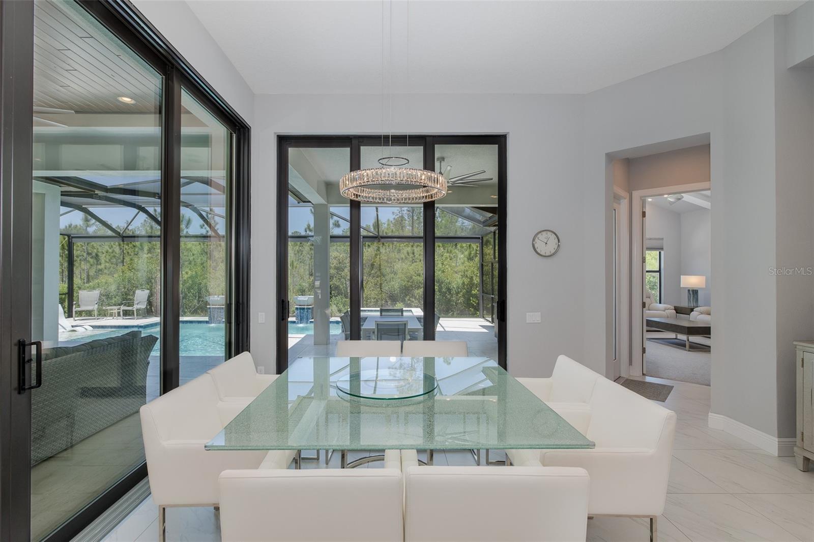 Elegant Dining room with custom lighting!