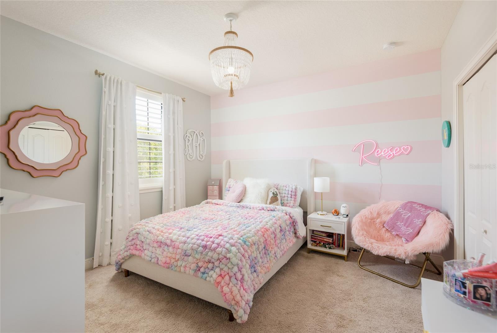 Bedroom 3 with custom closet and shutters