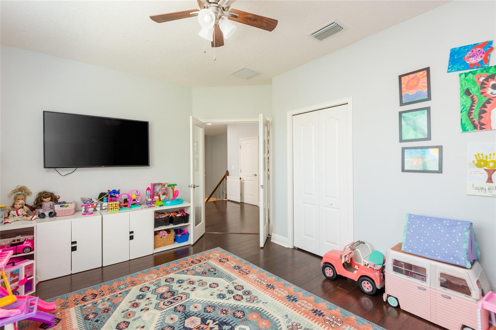 Bedroom 5 or optional playroom or home office with French doors.