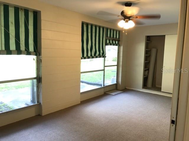 Florida room with view of closet