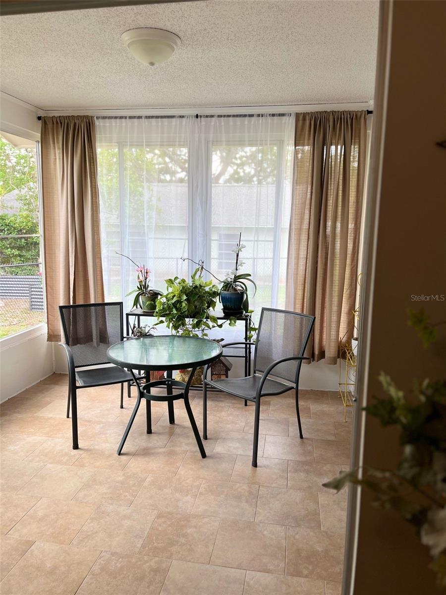 Enclosed patio with slider windows