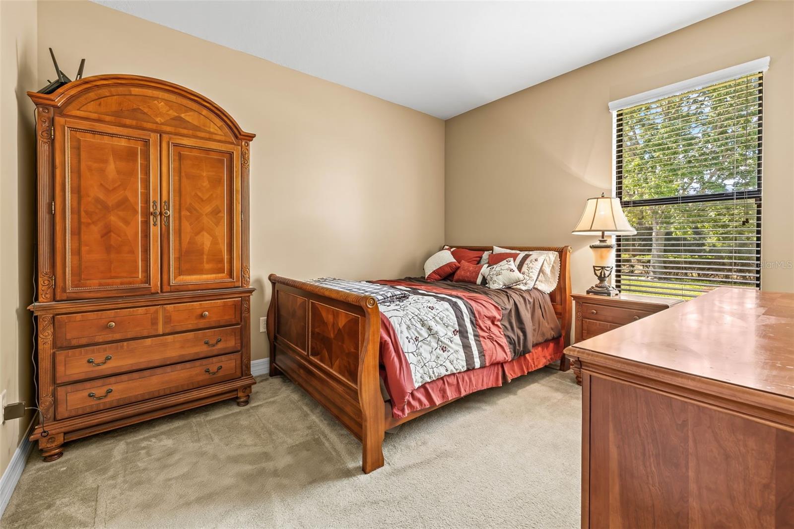 Bedroom 5 sits on the first floor as a guest suite