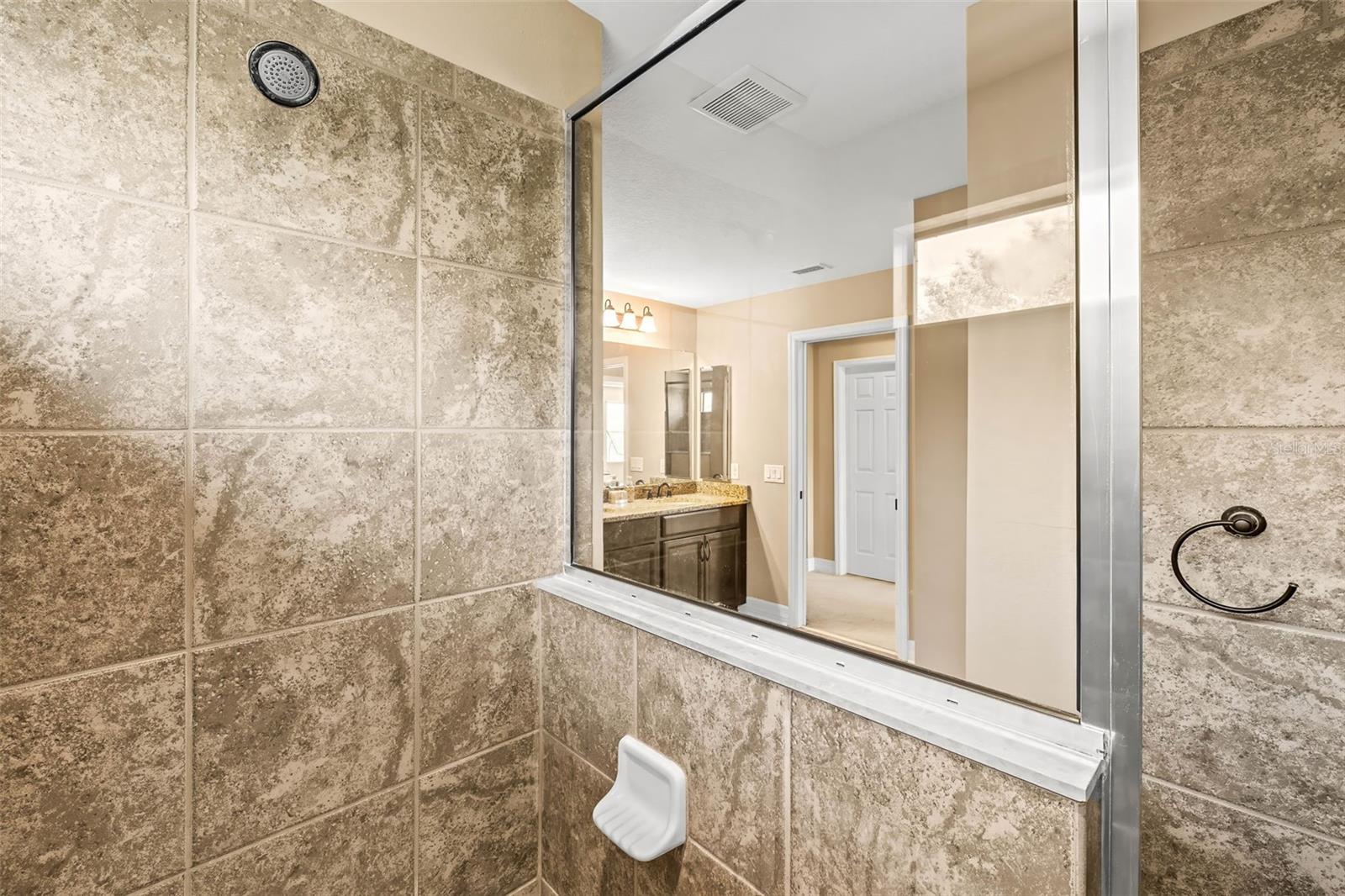 This shower in the primary is just dreamy!