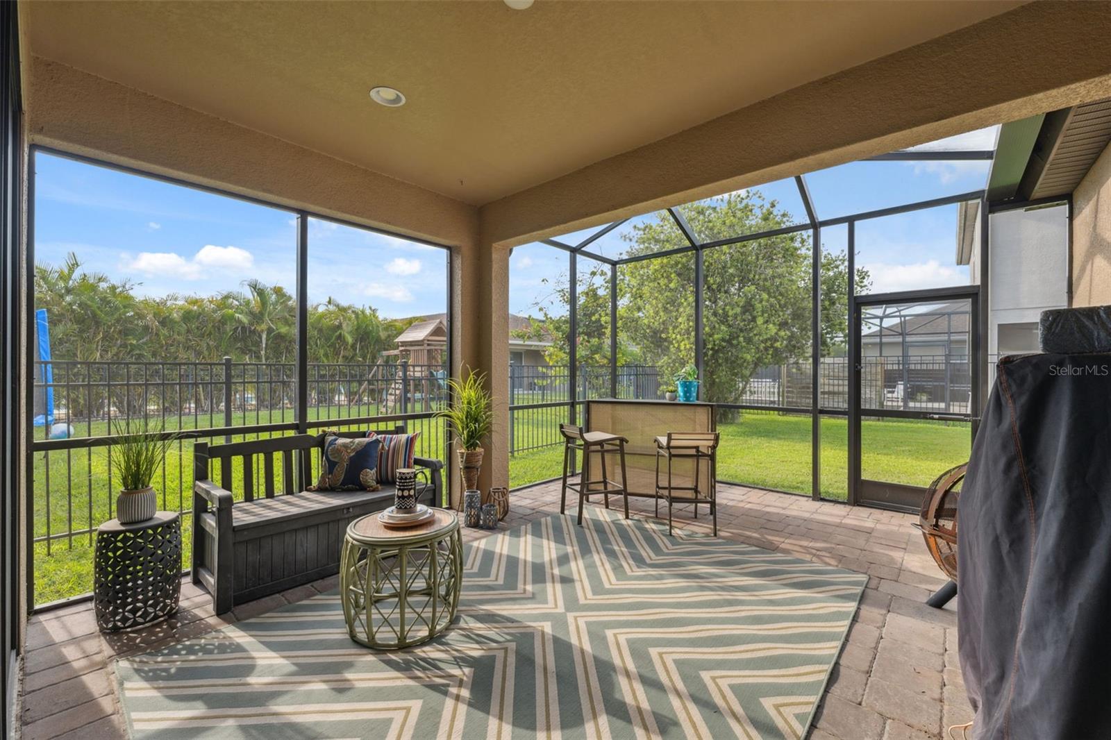 Expanded, screened in Lanai