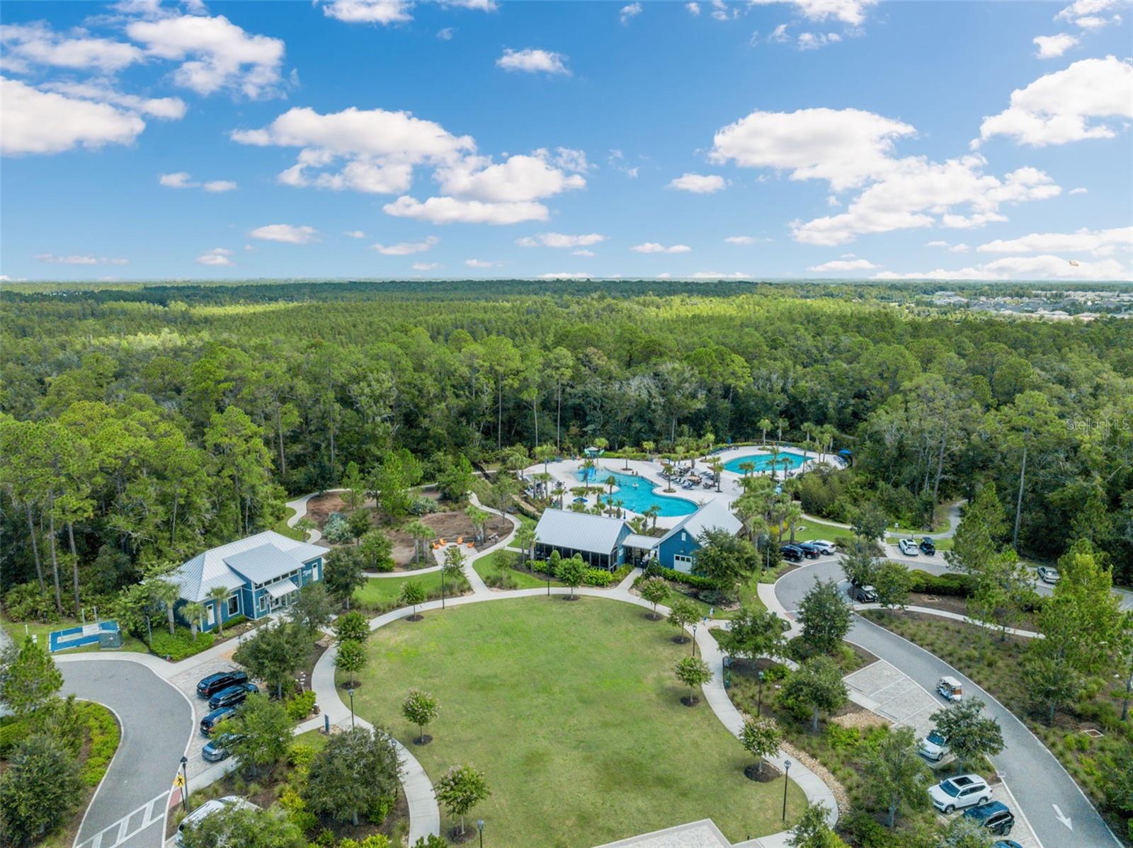 Gym, premium landscaping, and pools
