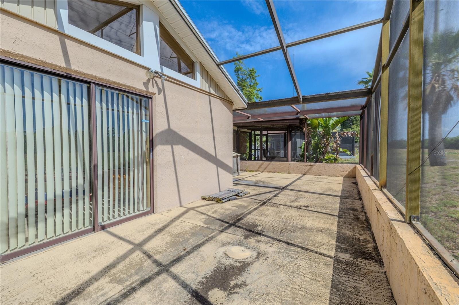 Lanai and sliding doors to Primary Bedroom